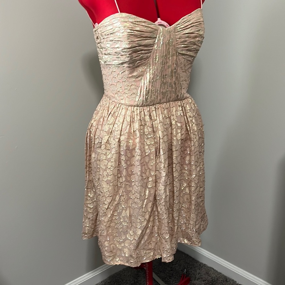 Short prom dress. Shimmery fabric in a sort of leopard design (but it’s subtle)